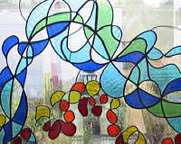 glas in lood in staal venster - Lia Koster- uitgevoerd door Segno 'd Arte